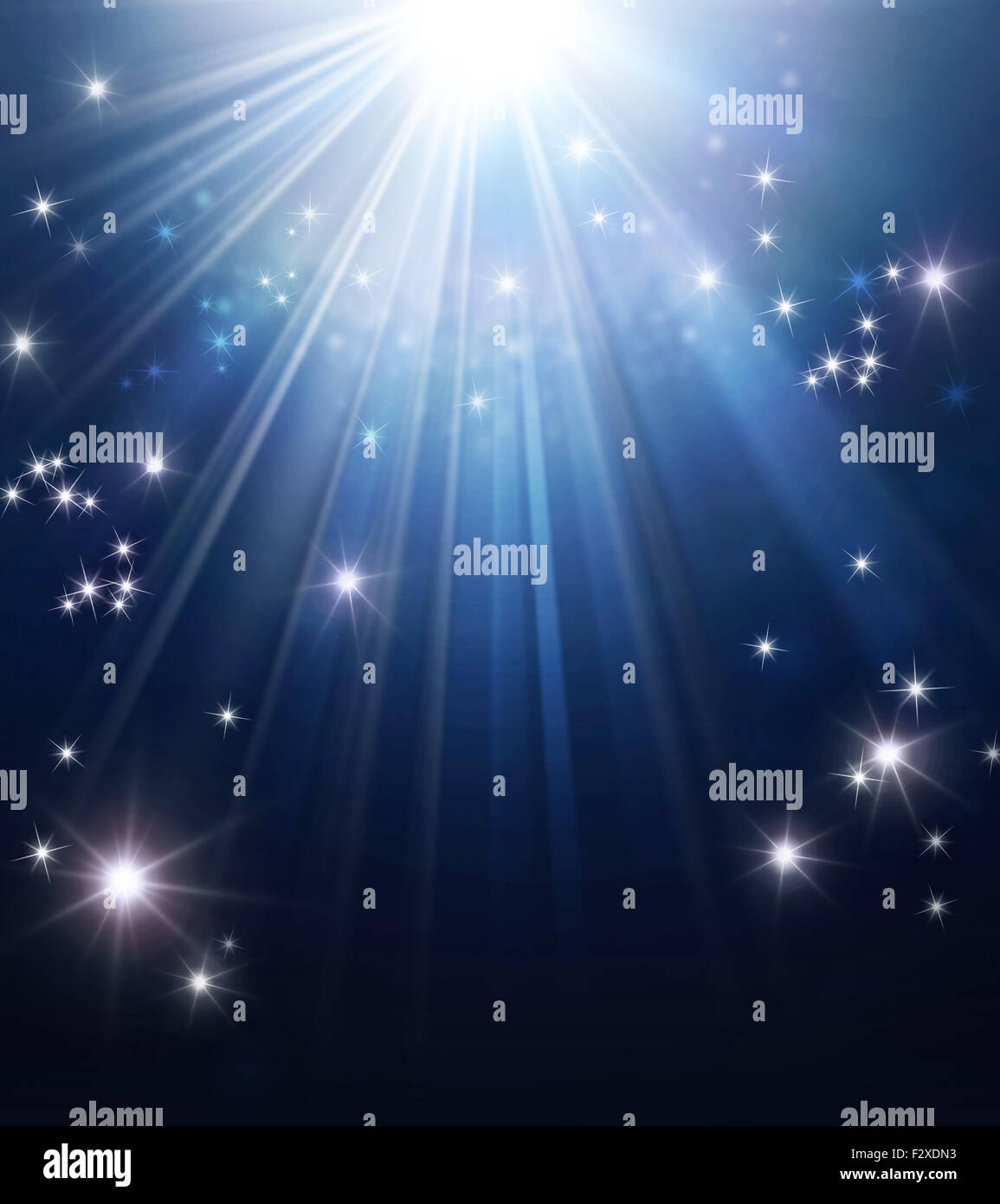 Shiny blue background with star lights raining down Stock Photo