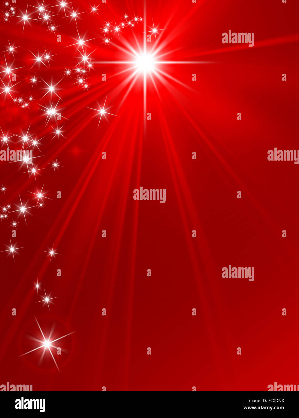 Glowing star on red background with starlight raining down Stock Photo