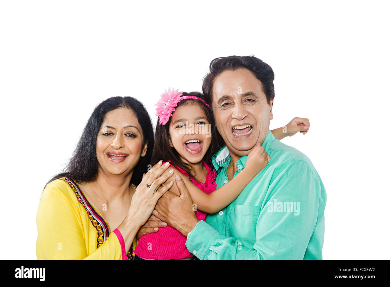 3 indian Grandparents and Kid Granddaughter caring Stock Photo