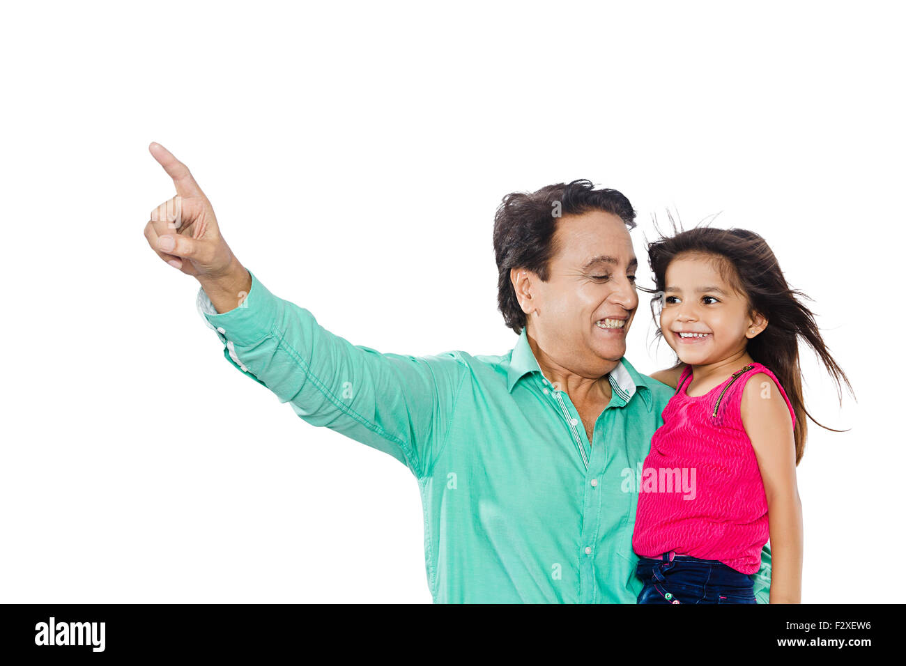 2 indian Grandfather and Kid Granddaughter finger pointing gesturing Stock Photo