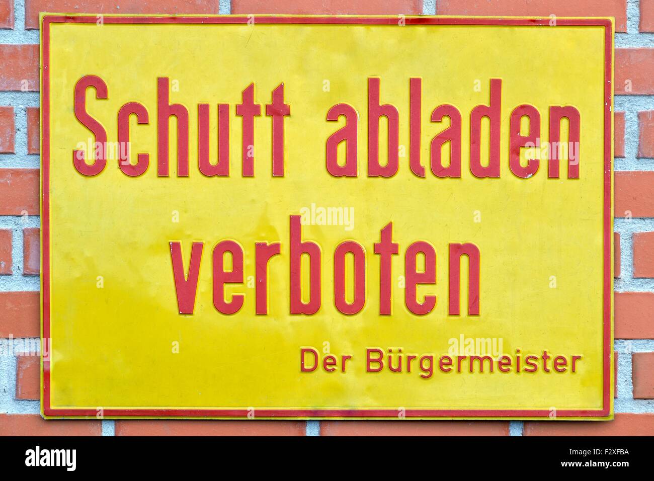 Old sign, unloading rubble prohibited, in German, Germany Stock Photo