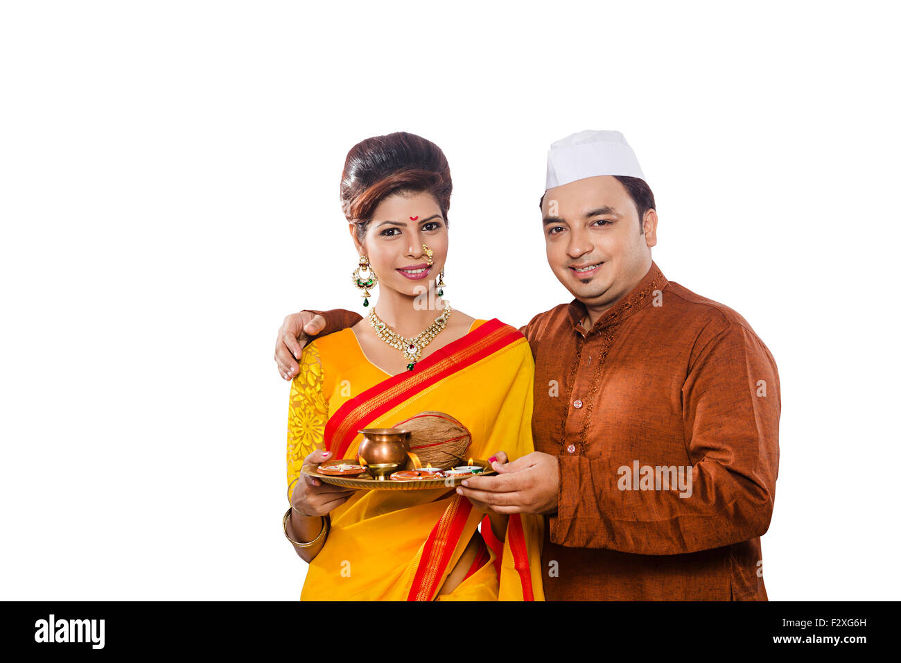2 indian Marathi Adult Married Couple diwali Aarti Worship Stock Photo