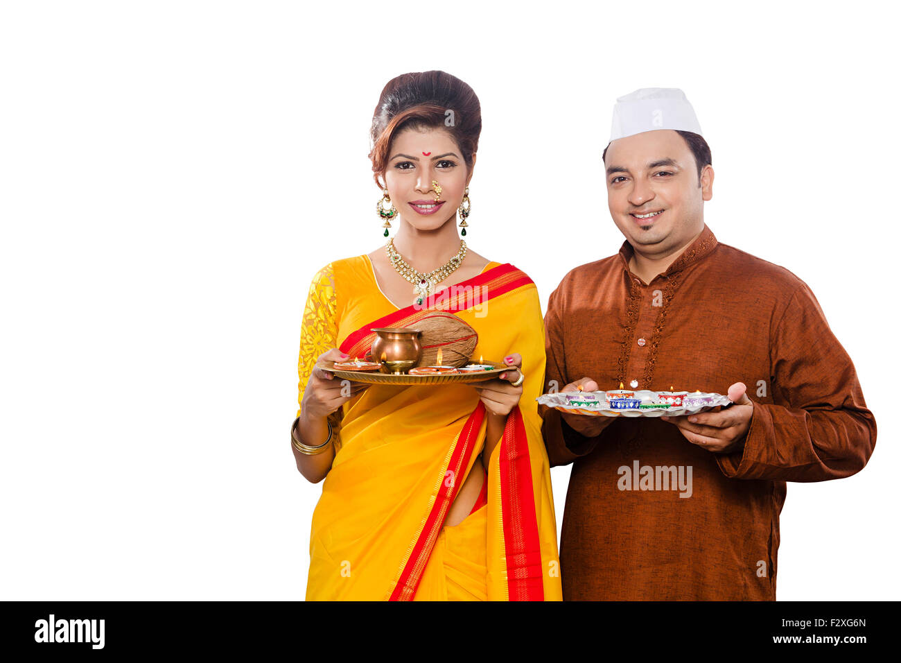 2 indian Marathi Adult Married Couple diwali Aarti Worship Stock Photo