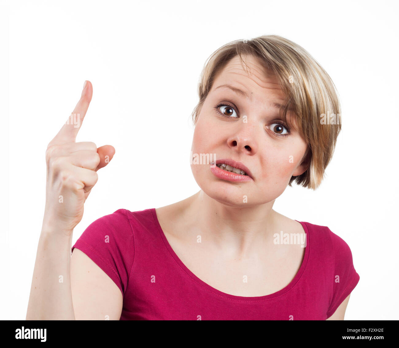 Close up view of a young woman scolding somebody, isolated on white Stock Photo