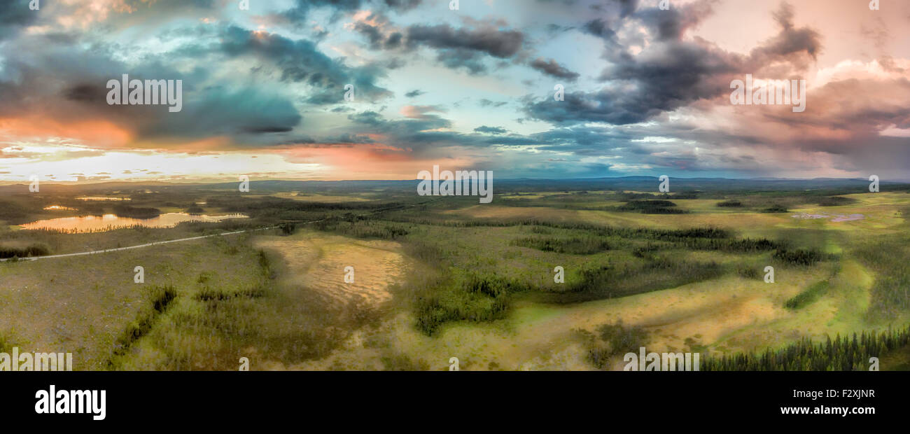 Aerial panorama of huge storm clouds forming over the forests in Sweden ...