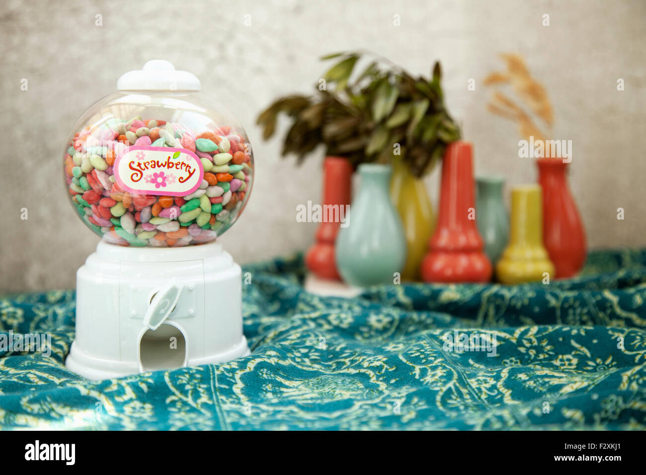 Bubble candy machine toy on a colorful background Stock Photo