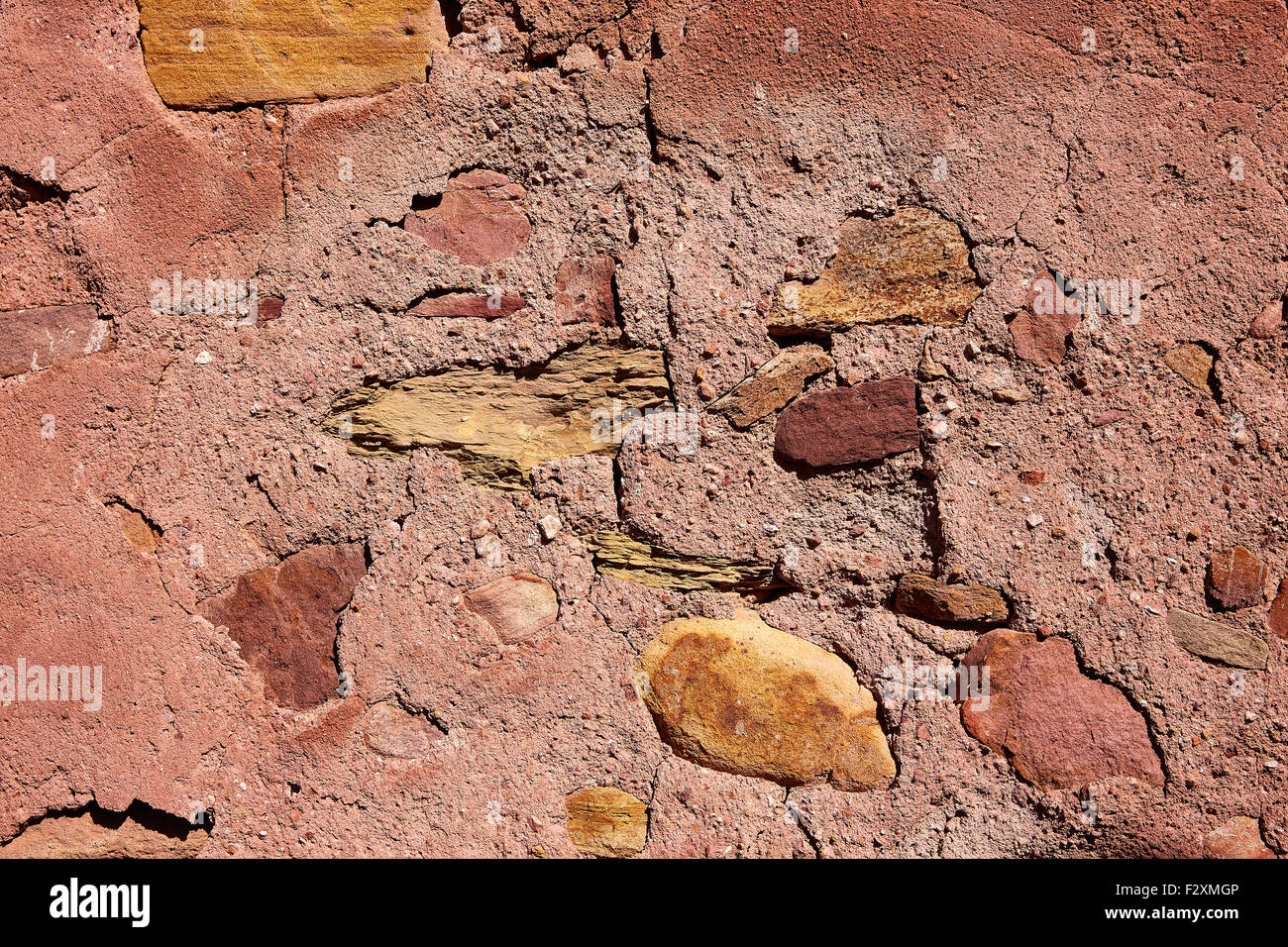 Red limestone masonry wall with rodeno mortar texture background Stock Photo Alamy