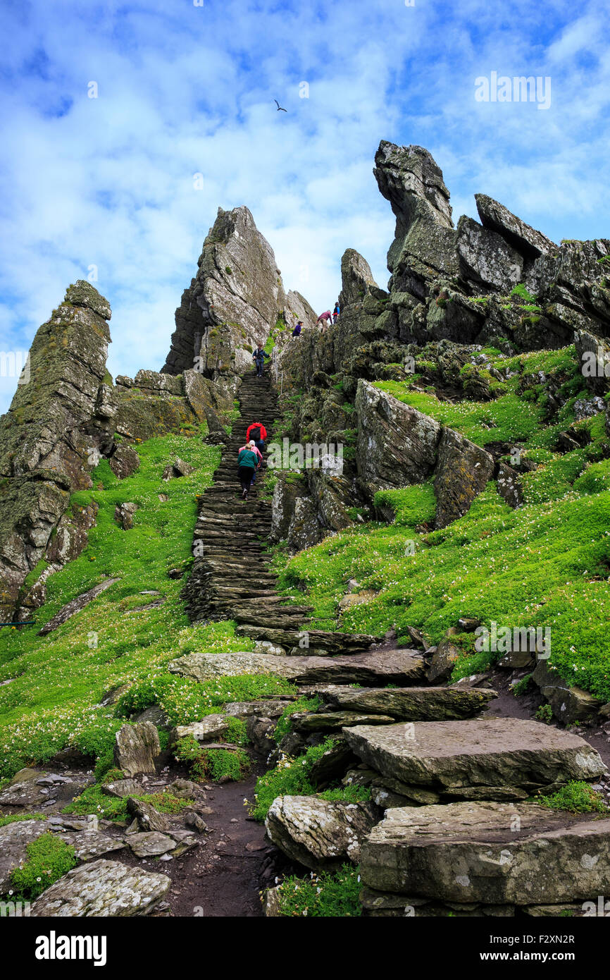 people climbing skellig michael rock skelligs isle Stock Photo