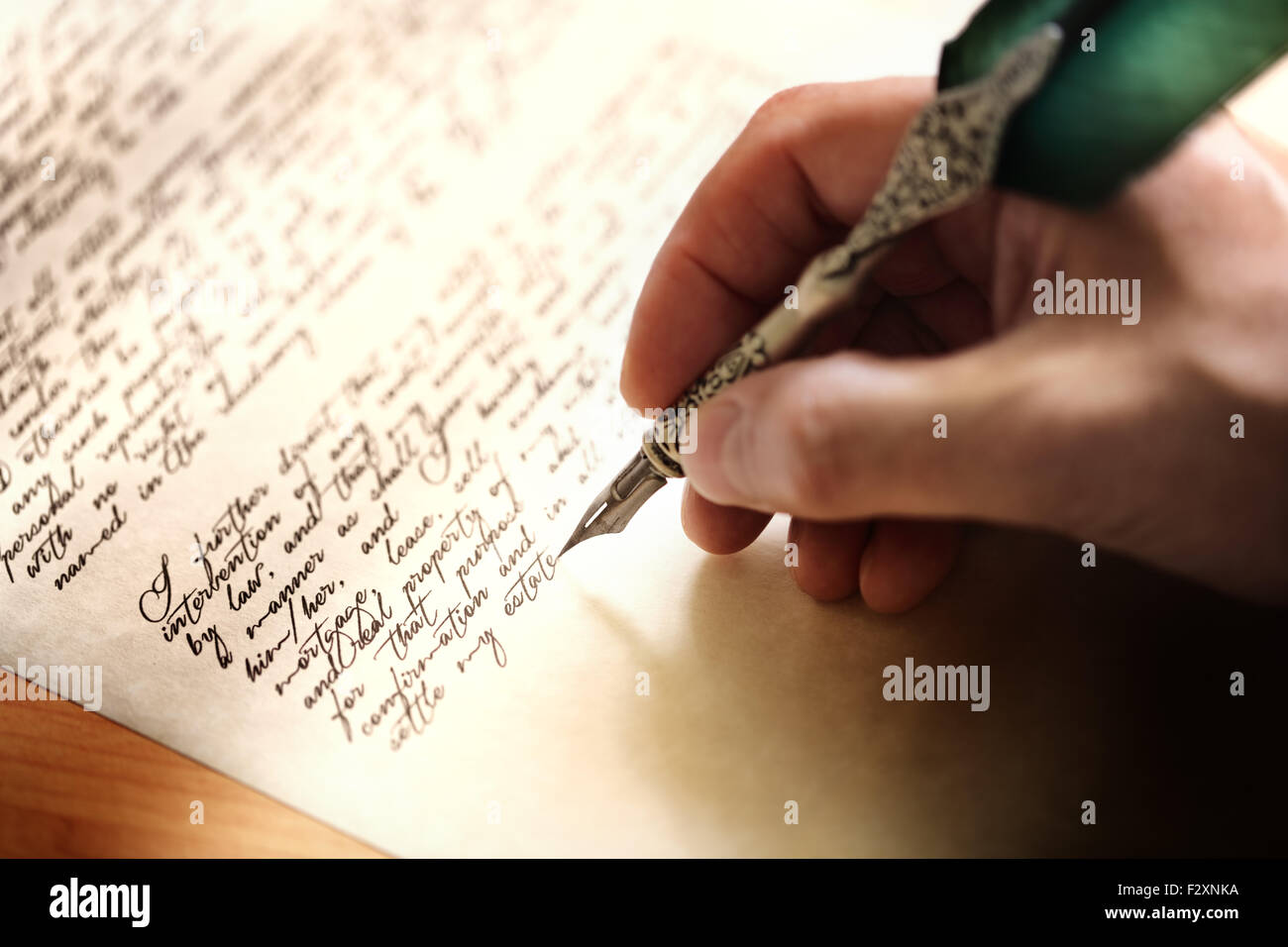 Writing with quill pen Stock Photo