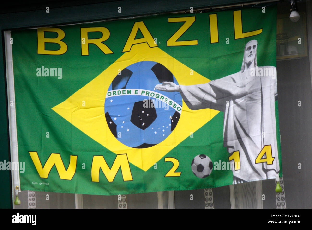 Flagge als Ankuendigung der Fussballweltmeisterschaft in Brasilien 2014, Berlin. Stock Photo