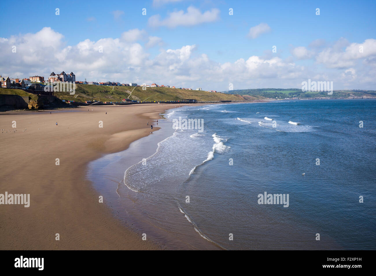 A retreating tide at the 'Blue Flag' Whitby Sands, North Yorkshire, England, UK Stock Photo