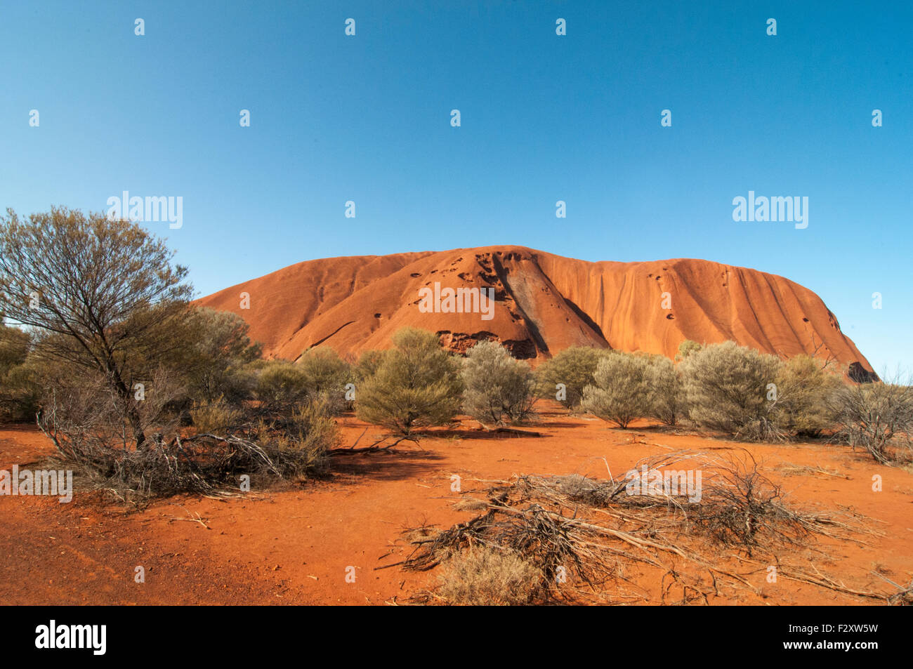 Approaching Uluru or Ayers Rock, in late afternoon, Central Australia Stock Photo