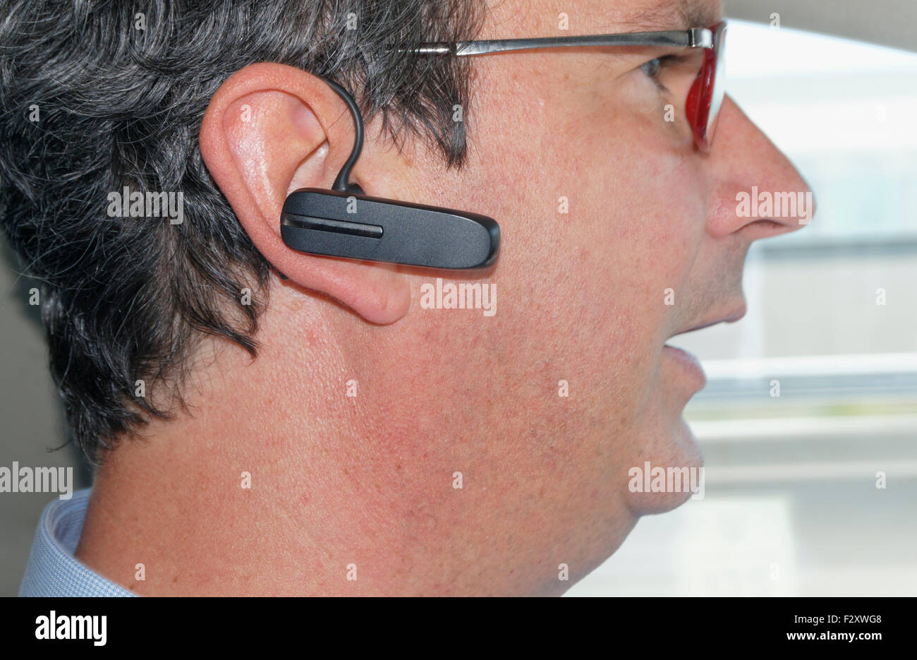 Wireless bluetooth hands free headset Stock Photo