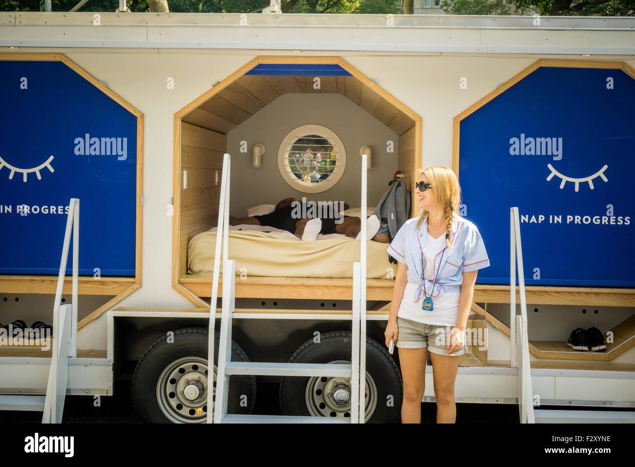 A satisfied mattress tester in the Casper Nap Tour promotional trailer