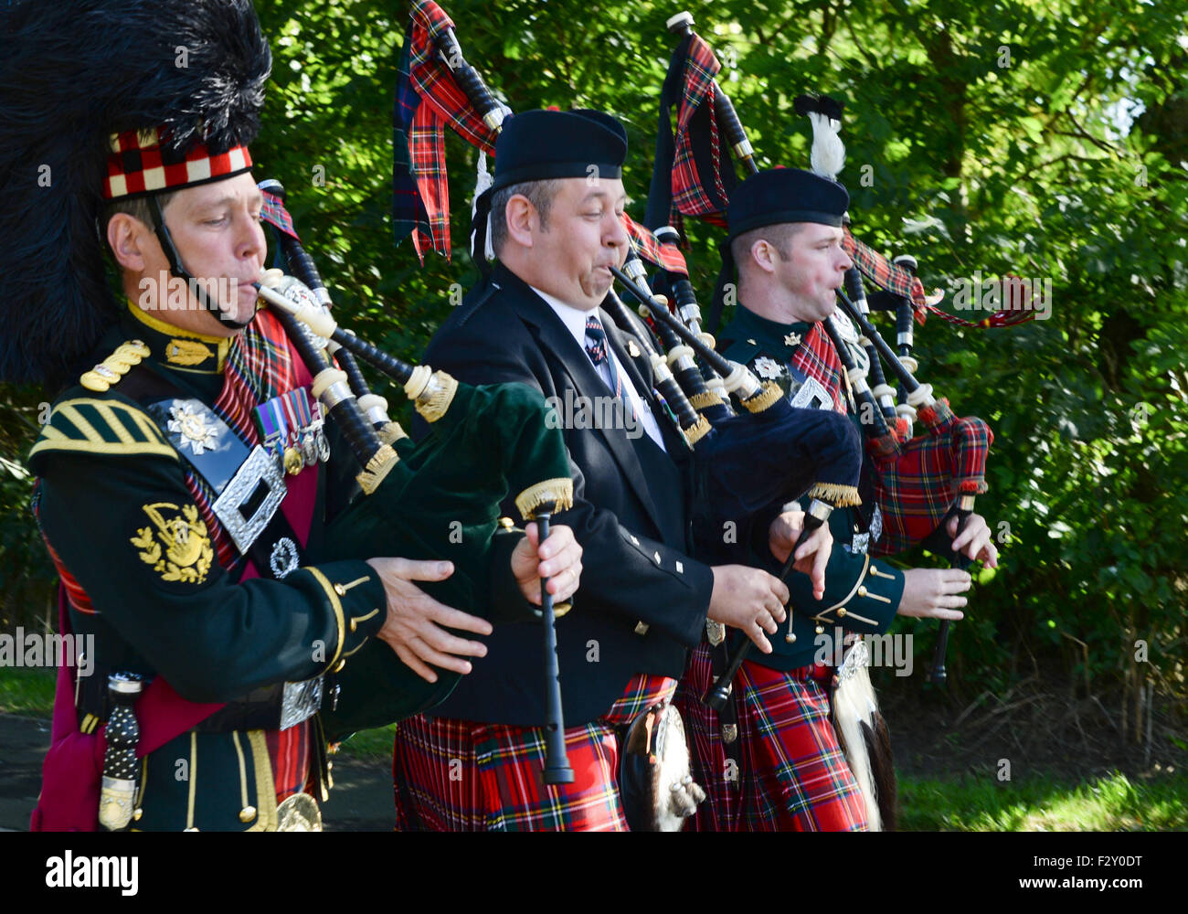 Swinton, UK. 25th Sep, 2015. The Laying of the Commerative VC Stone in the small Scottish Border village of Swinton to mark the 100th Anniversary of the award of the Victoria Cross to Piper Daniel Laidlaw for his actions whilst serving with the 7th Battalion of the King's Own Scottish Borderers.   Daniel Logan Laidlaw was born at Little Swinton, Berwickshire on 26 July 1875 and joined the Army in 1896. He served with the Durham Light Infantry in India where he received a certificate for his work during a plague outbreak in Bombay in 1898. Stock Photo