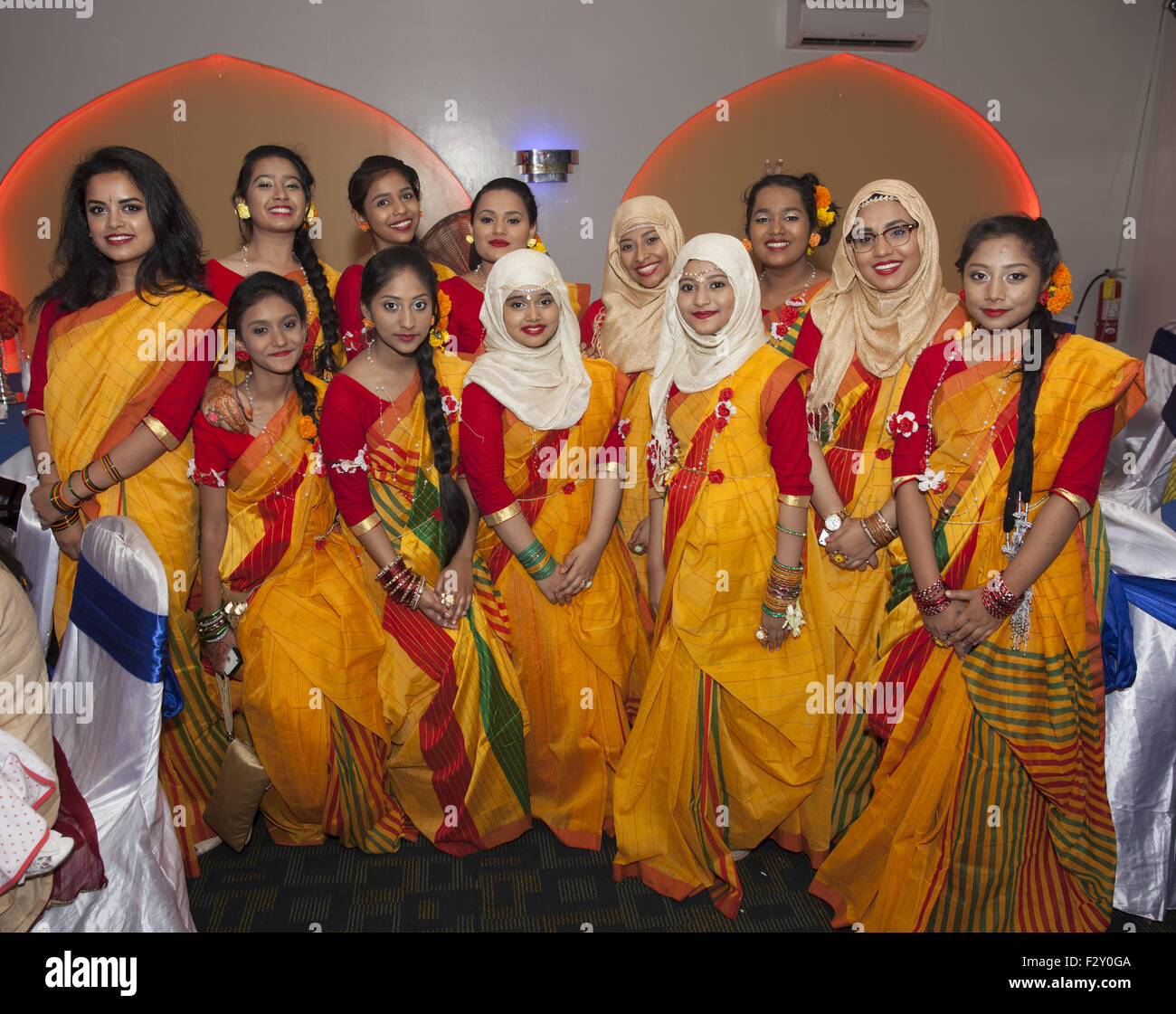 Female family & friends of the bride at a Bangladeshi wedding in Brooklyn, NY. Stock Photo