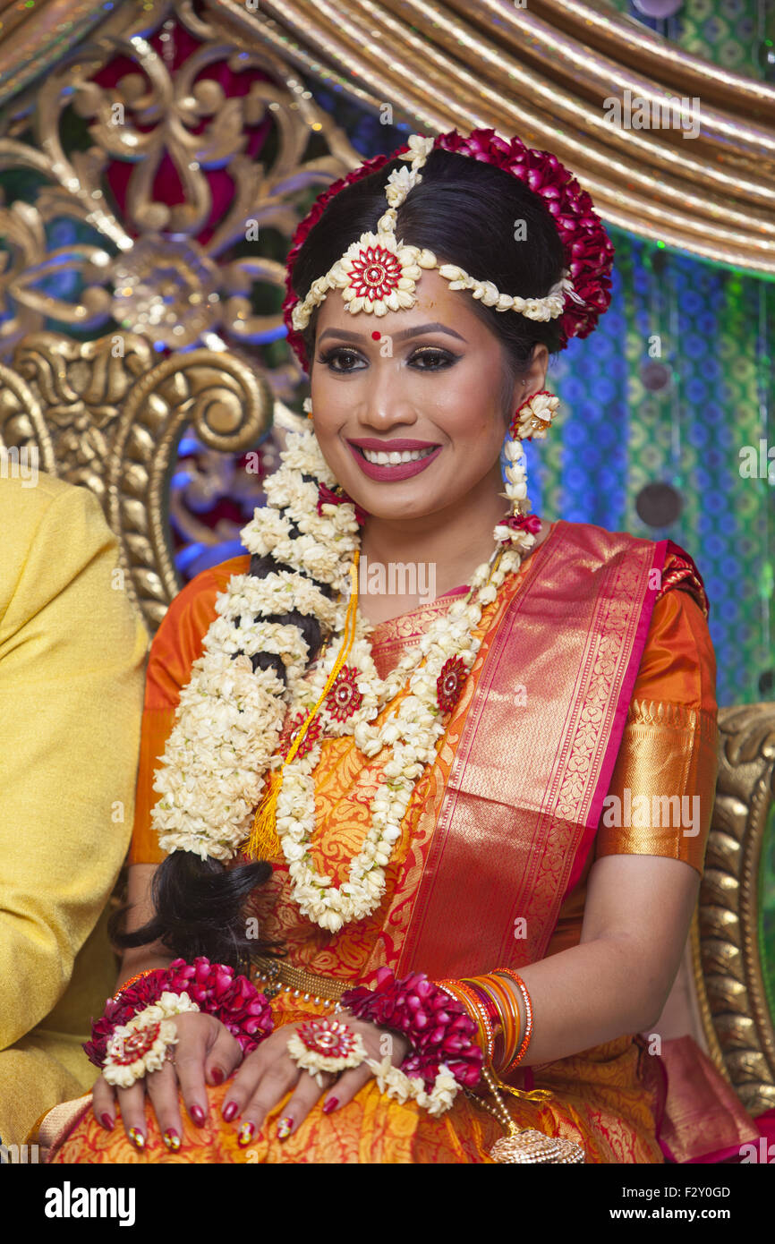 Young Bangladeshi American bride at her wedding reception in Brooklyn, NY. Stock Photo