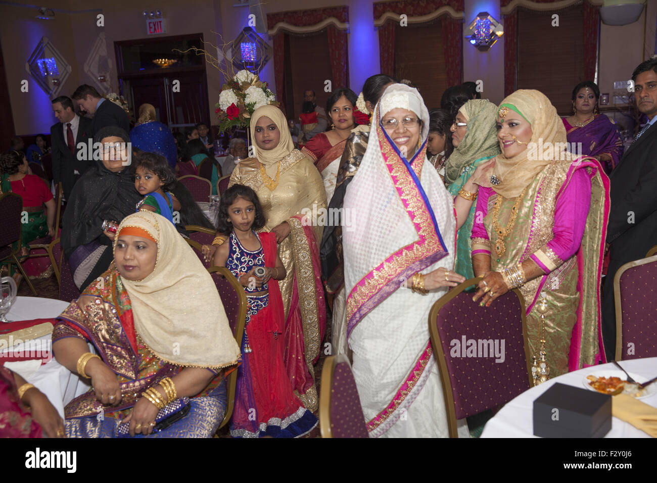 Guests at a Bangladeshi Muslim wedding reception in ...