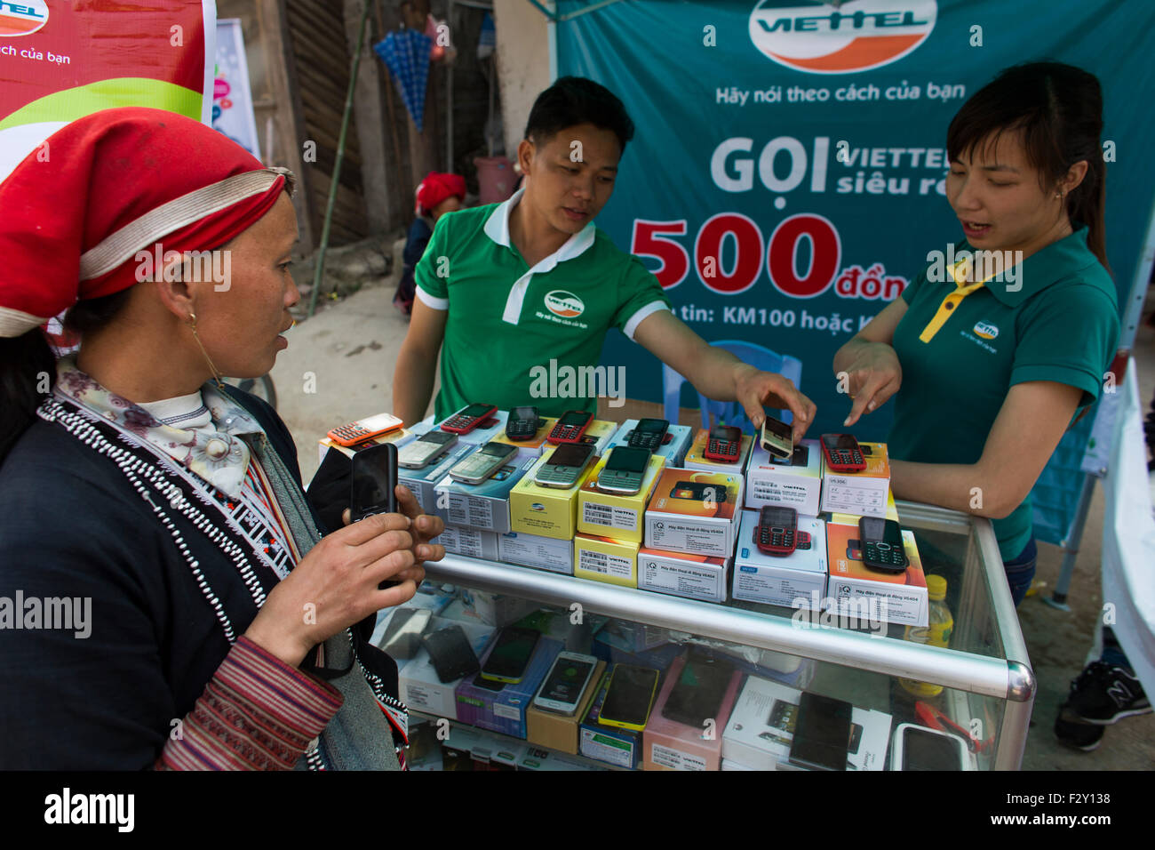 Mobile phone vendor selling phones to Hmong hill tribe people Stock Photo