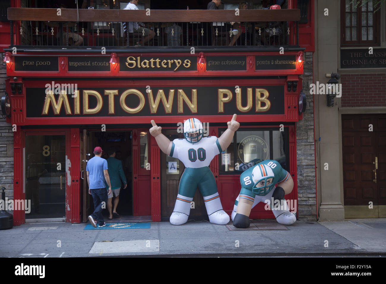 The Midtown Pub in Manhattan is open for the kick-off of the football season. Stock Photo