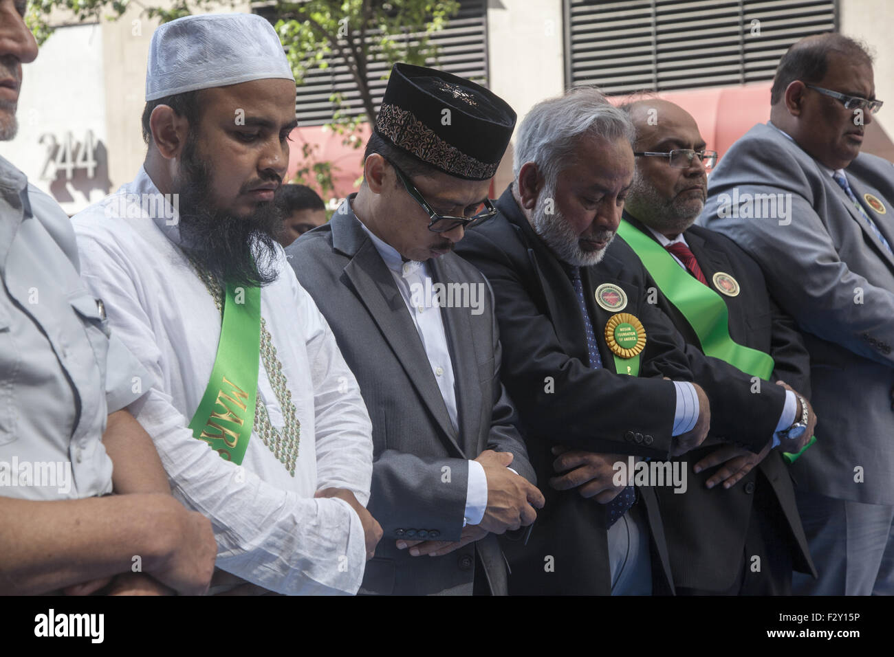 Muslims pray on Madison Ave. before the start of the American Muslim  Day Parade in New York City. Stock Photo