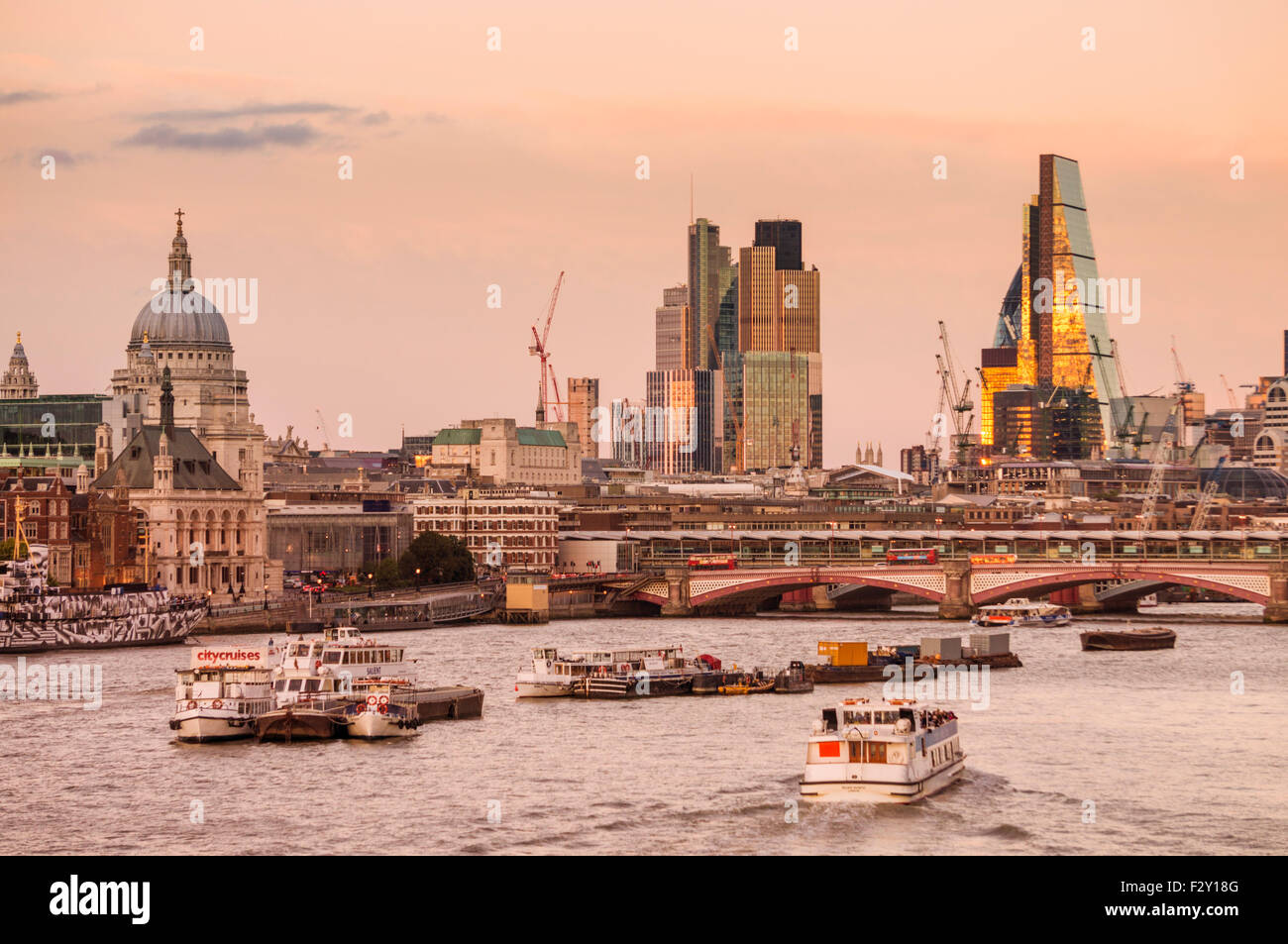St Pauls cathedral and City of London skyline financial district at sunset River Thames City of London UK GB EU Europe Stock Photo