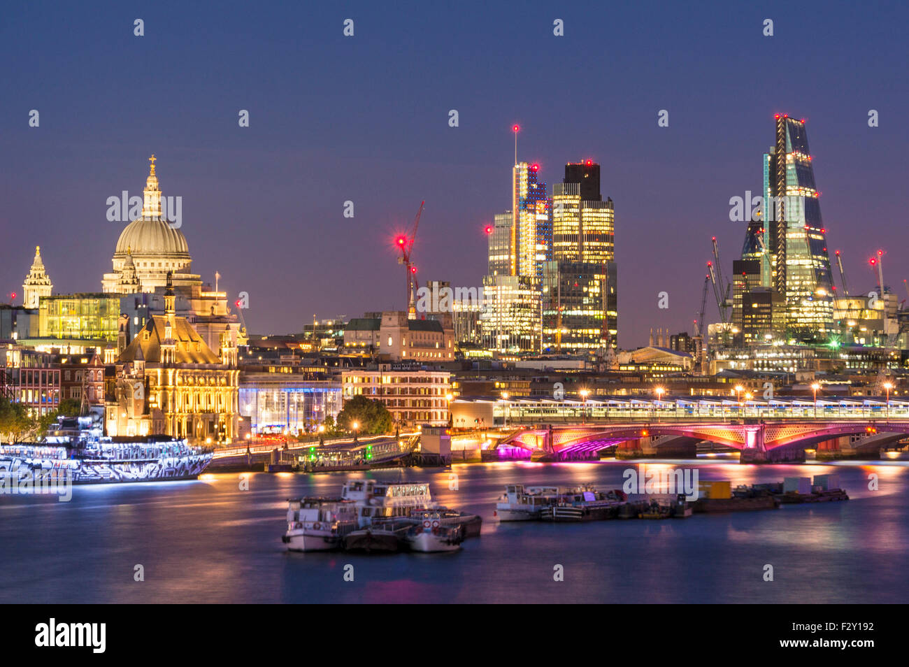 St Pauls cathedral and City of London skyline financial district at sunset River Thames City of London UK GB EU Europe Stock Photo