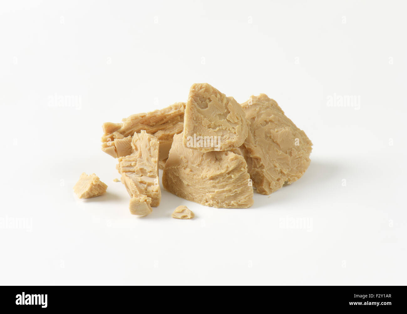 Pieces of compressed fresh yeast Stock Photo