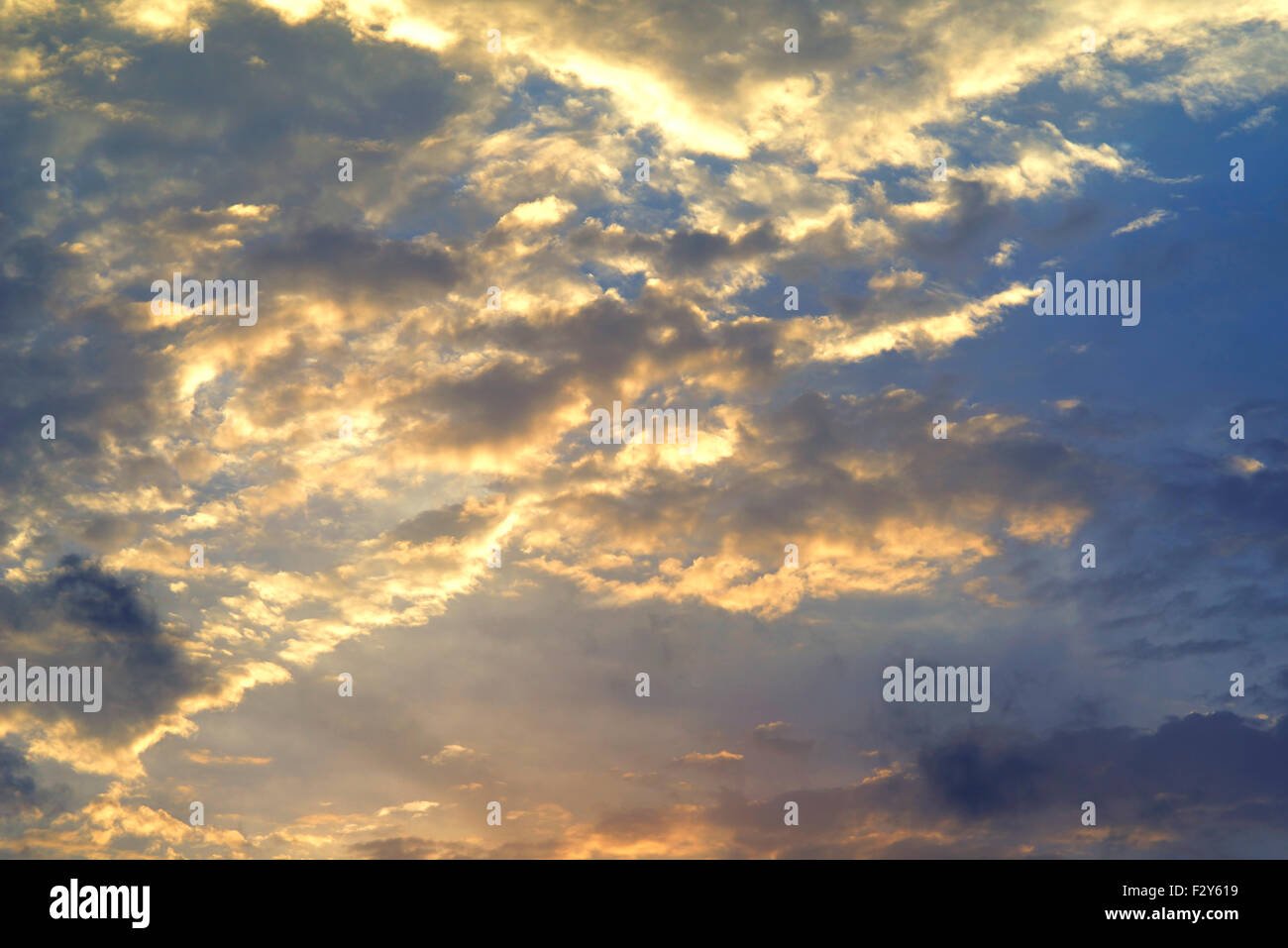 Dramatic Sunlight with Vivid Clouds in Sky. Stock Photo