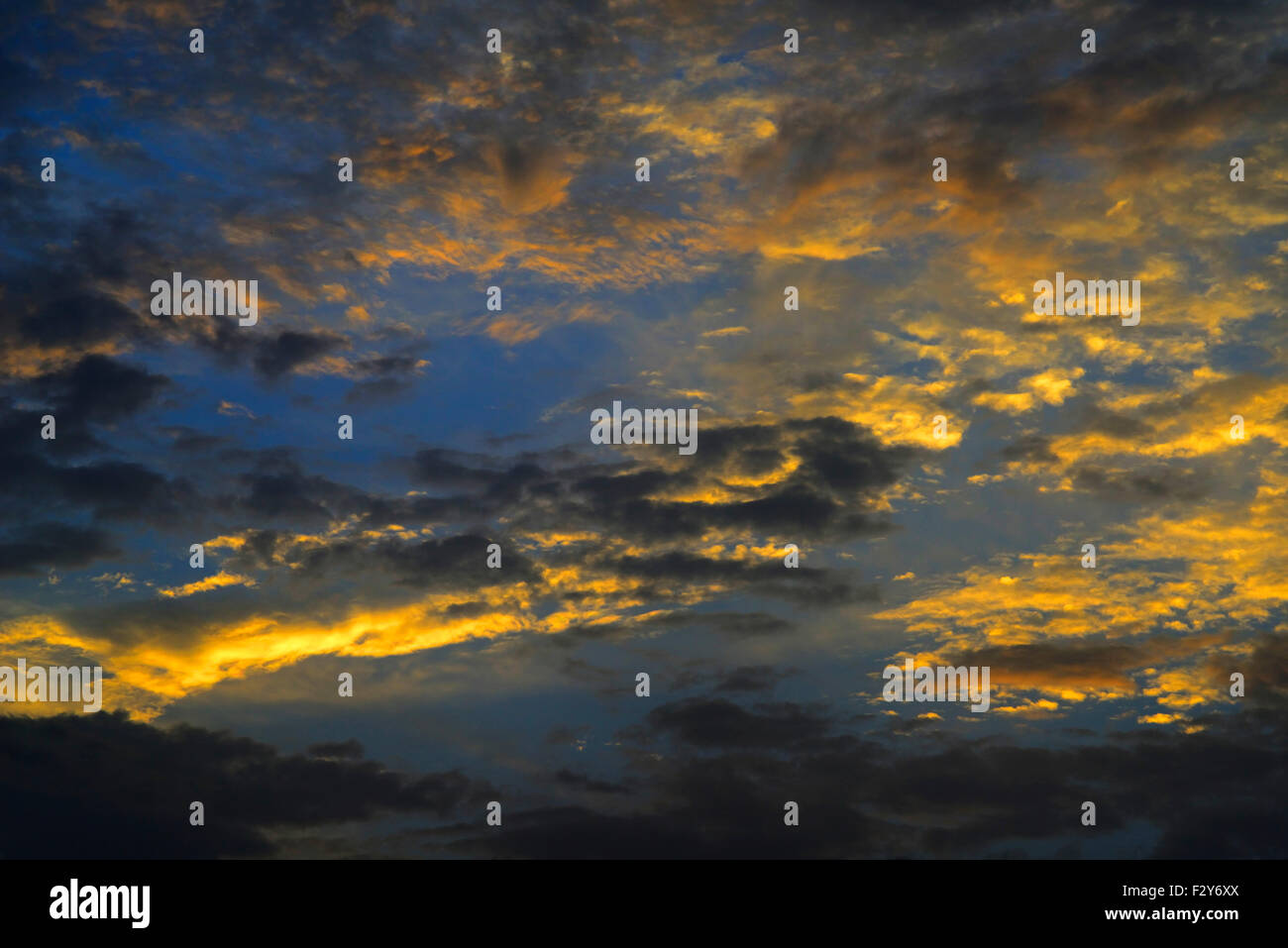 Dramatic Sunlight with Vivid Clouds in Sky. Stock Photo
