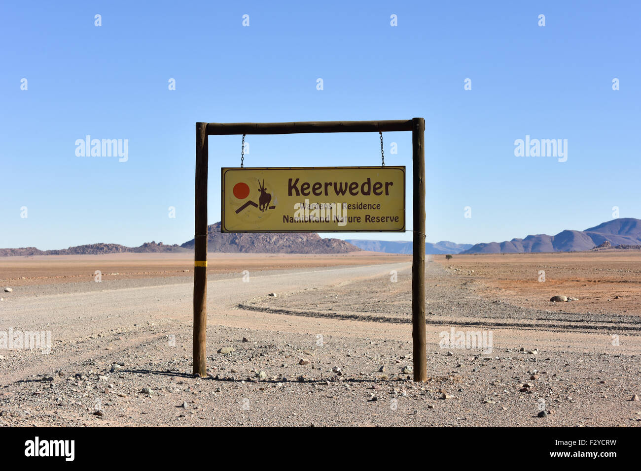 Keerweder Wardens Residence and the desert landscape of the NamibRand Nature Reserve in Namibia. Stock Photo