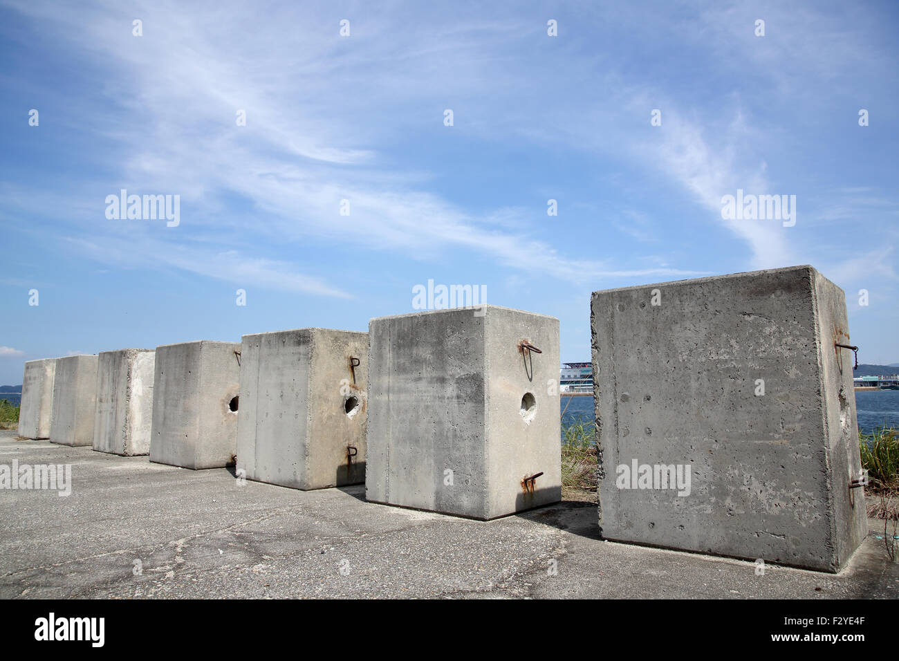 abandoned of concrete brick against a blue sky Stock Photo - Alamy