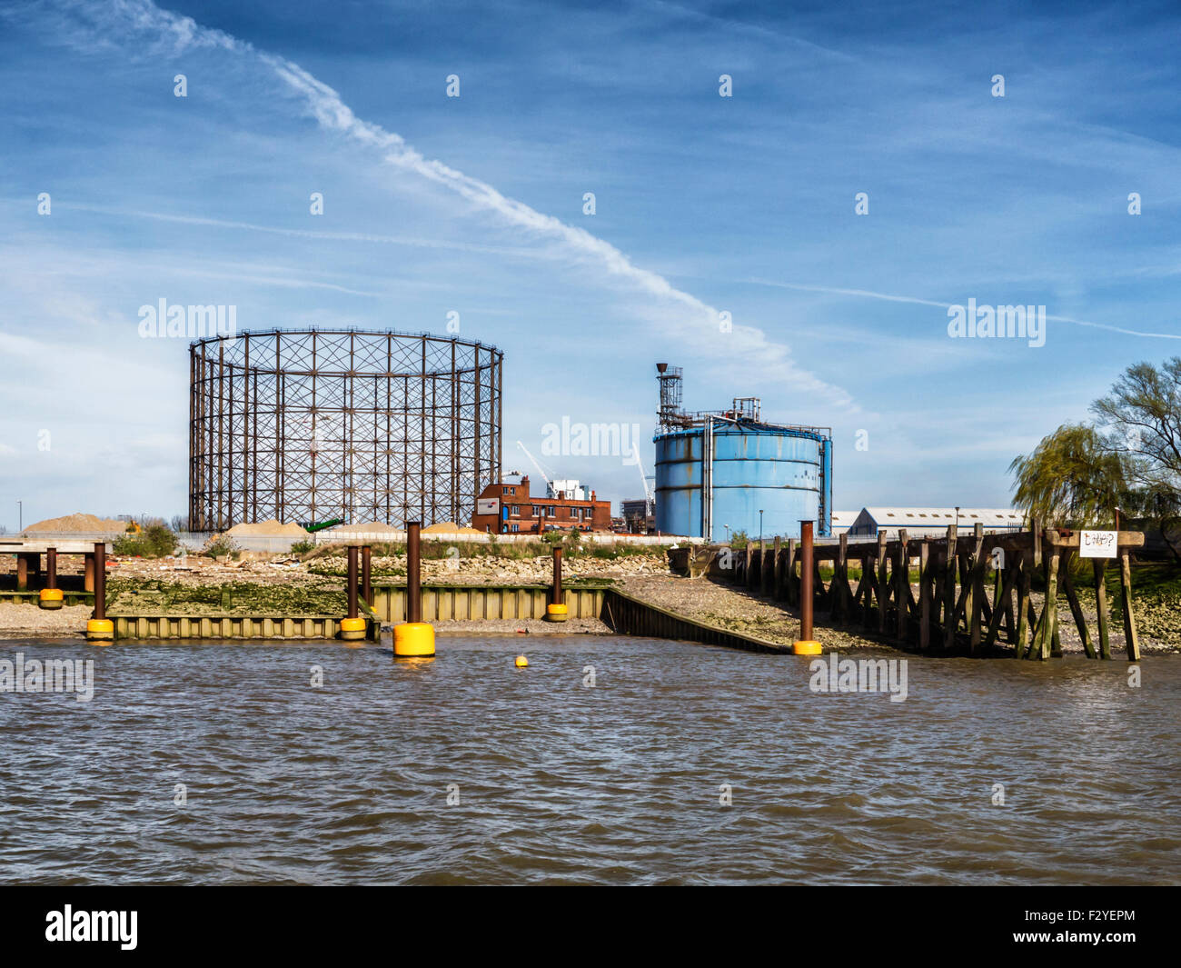 Greenwich, London, gasometer and gas storage tank, Thames river and