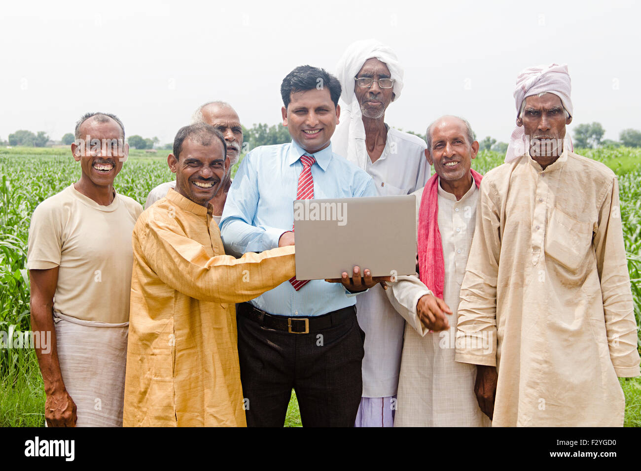 indian group crowds Business Man and rural farmer farm laptop working Stock Photo