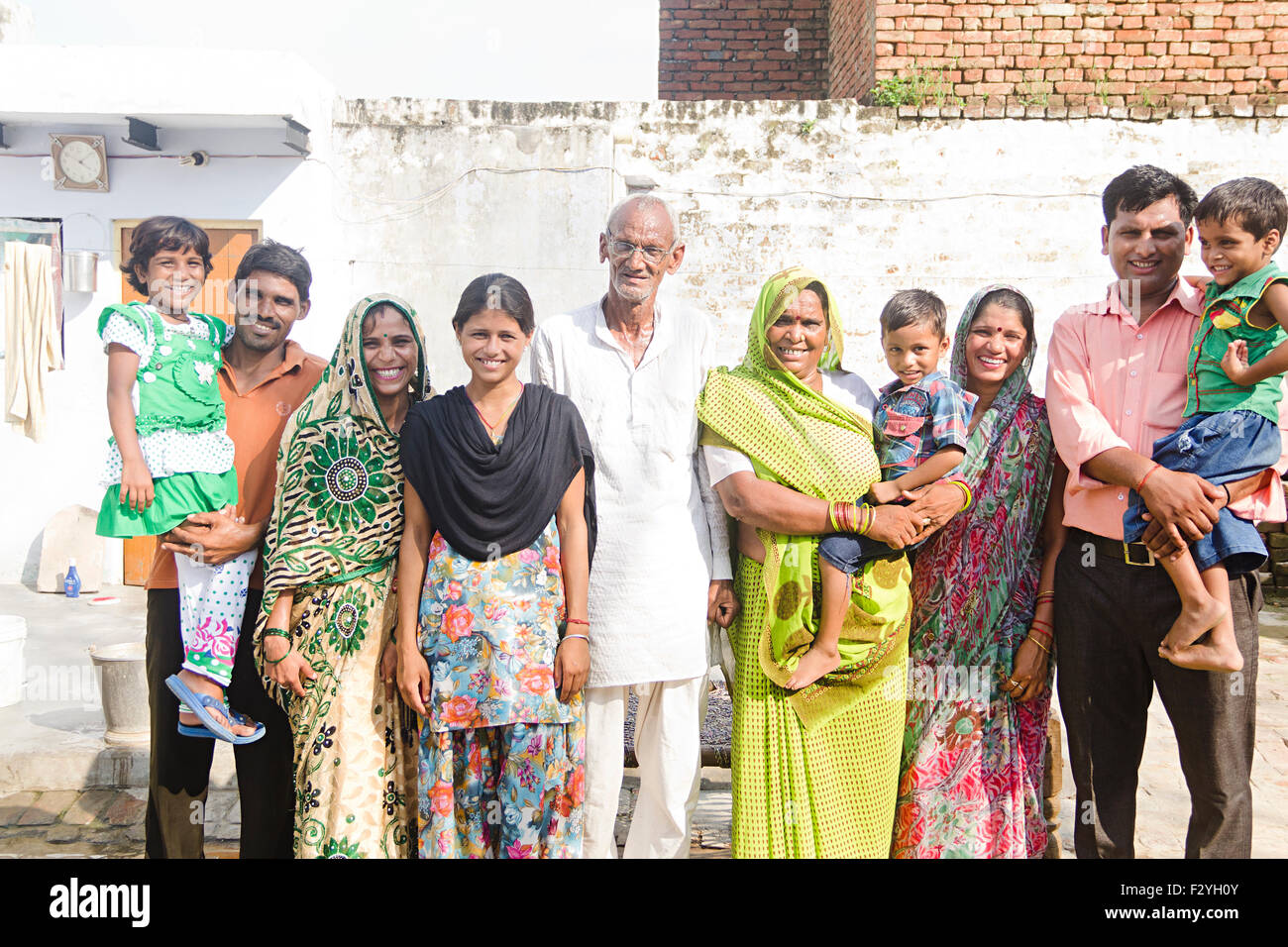 indian group crowds rural villagerJoint Family home standing Stock Photo