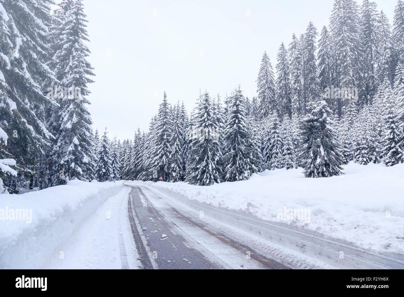 Snowy winter road in Julian Alps-Slovenia Stock Photo