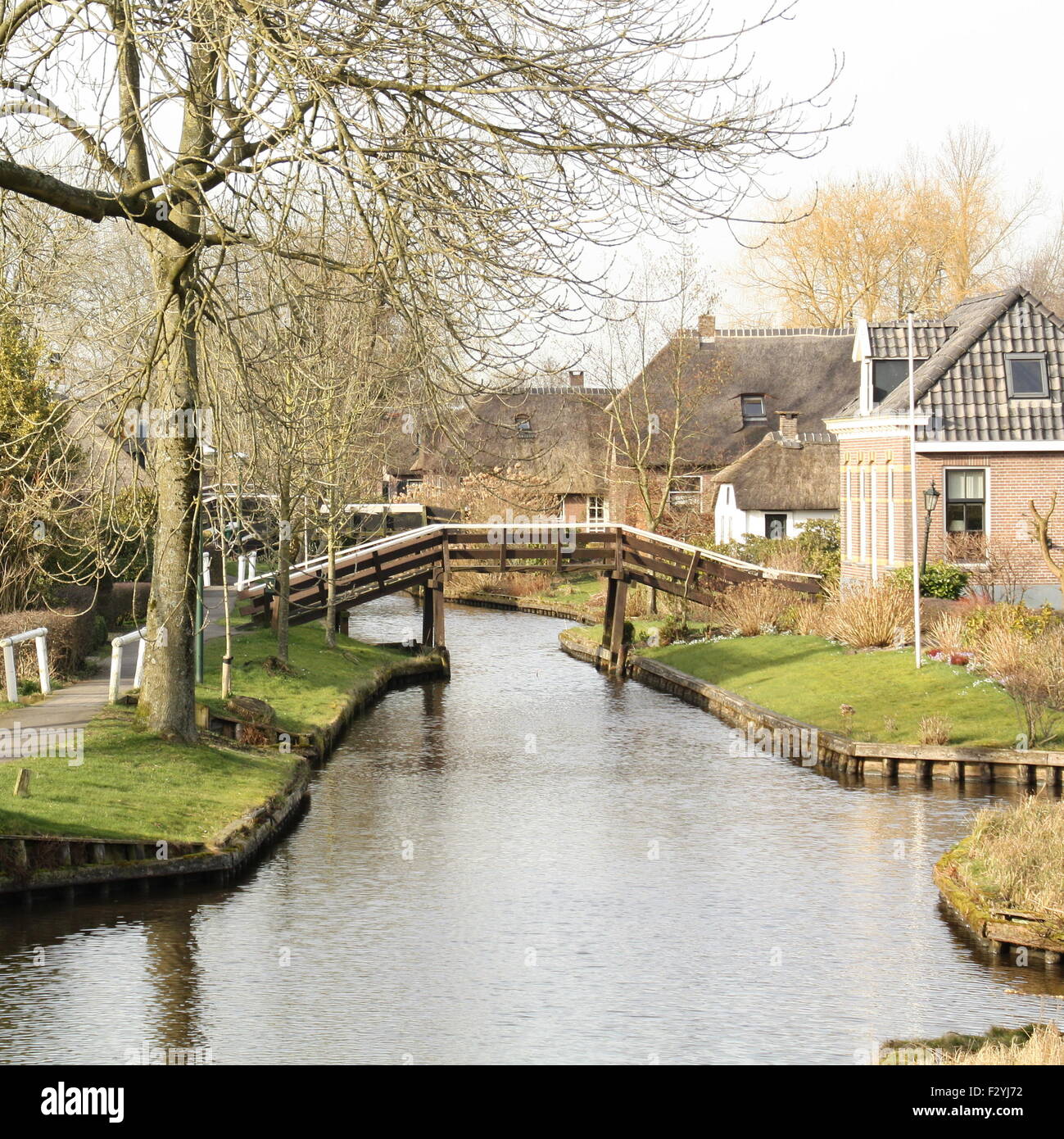 Wooden bridge over a canal in Giethoorn. Netherlands Stock Photo