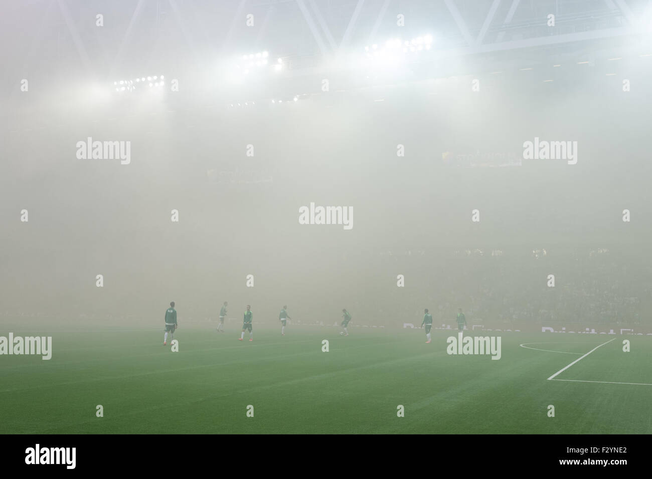 Temporary break during a football match due to pyro show at local derby between Stockholm rivals Djurgårdens IF and Hammarby IF. Stock Photo