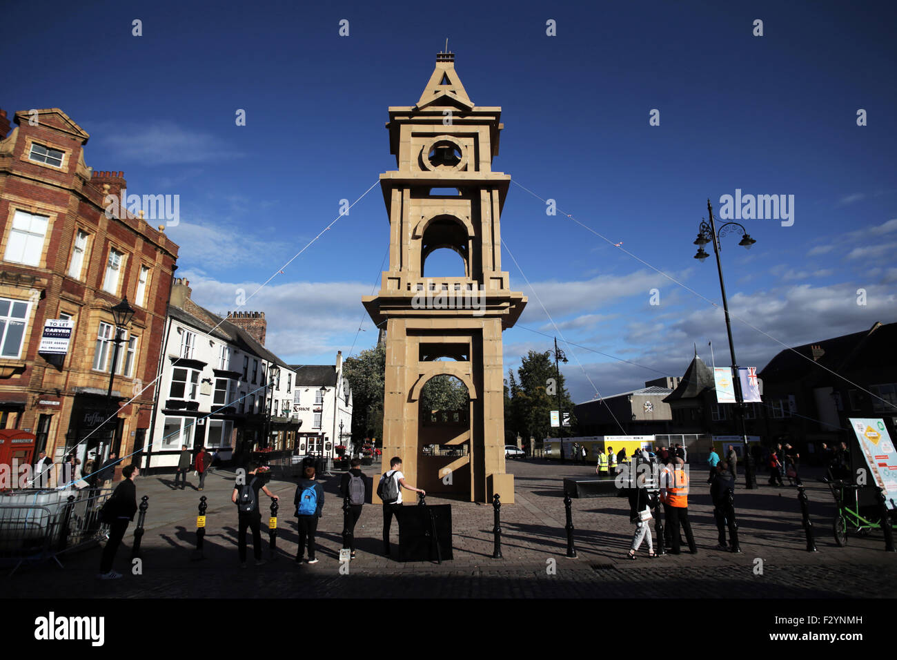 Darlington, UK. 25th Sep, 2015. A 26 metre high tower made entirely from cardboard boxes by the French artist Olivier Grossetete in the town of Darlington in North East England. The tower, a replica of the towns train station tower, was created to mark the opening of the annuall Festival of Thrift. Credit:  Stuart Boulton/Alamy Live News Stock Photo