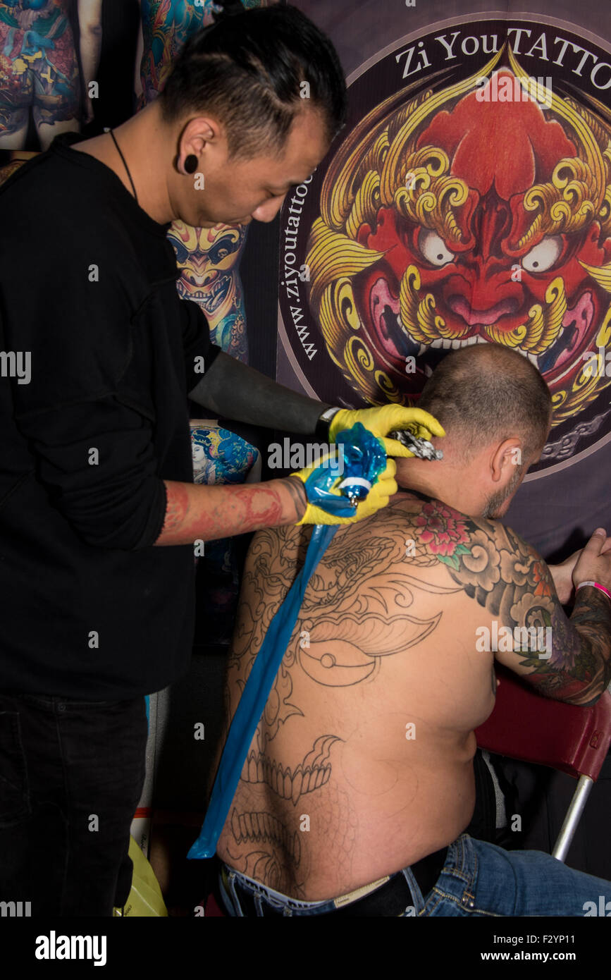 London, UK. 26th Sep, 2015. The 11th International London Tattoo Convention on 26th September 2015 at Tobacco Dock, Tower Hamlets, London, UK. Tattoo artists, fan and performers from around the world gather at Tobacco Dock for the three day convention Credit:  Terence Mendoza/Alamy Live News Stock Photo