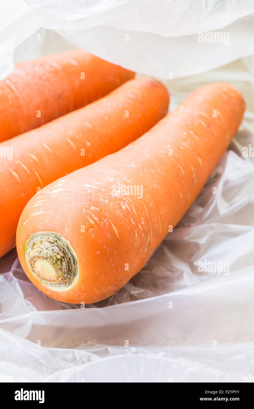 carrots vegetable on plastic bag Stock Photo Alamy