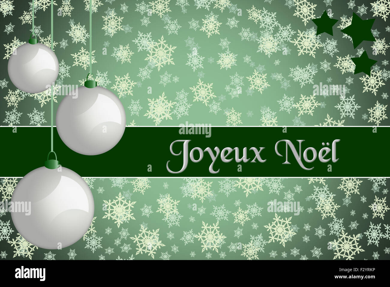 Christmas greeting card. 'Joyeux Noël' Green colored Christmas card with retro white baubles and snowflake background. Stock Photo