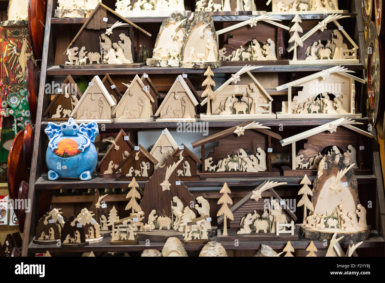 Wooden Nativity scenes for sale inside the Cloth Hall (Sukiennice) in Krakow, Poland Stock Photo