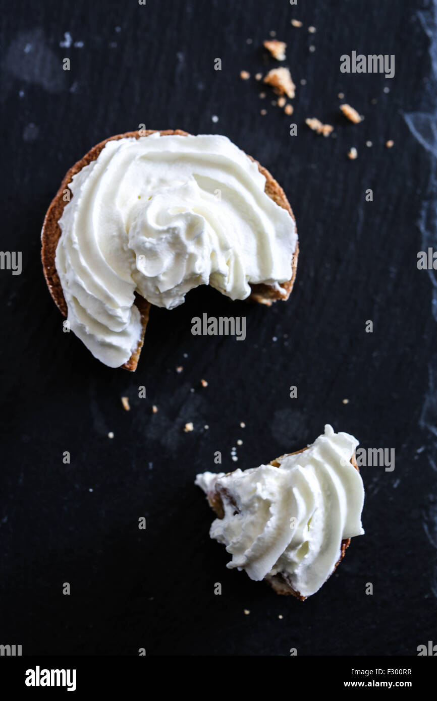 Pumpkin mini pie whipped cream topping Stock Photo Alamy