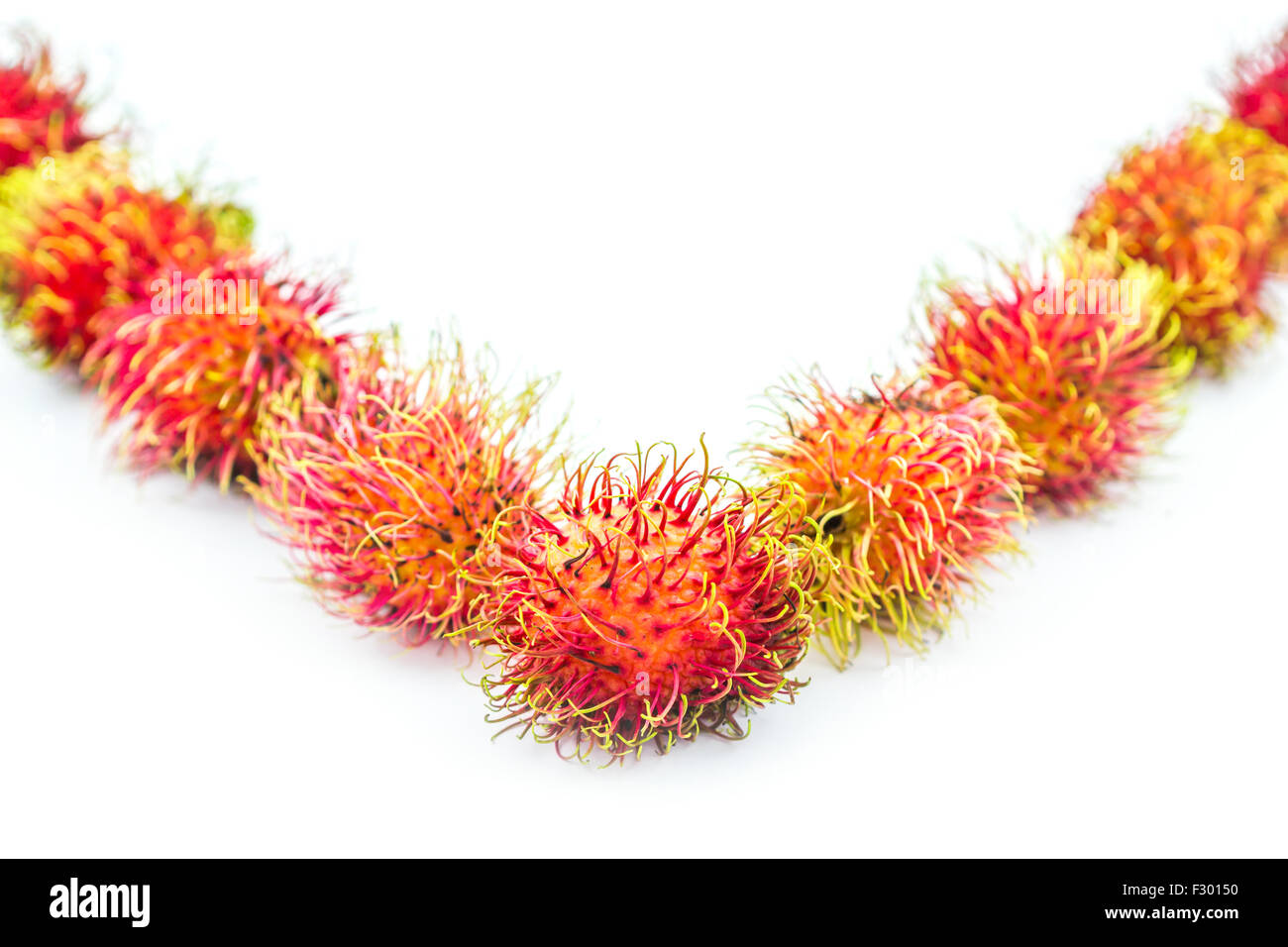 Rambutan tropical fruit on white background Stock Photo - Alamy
