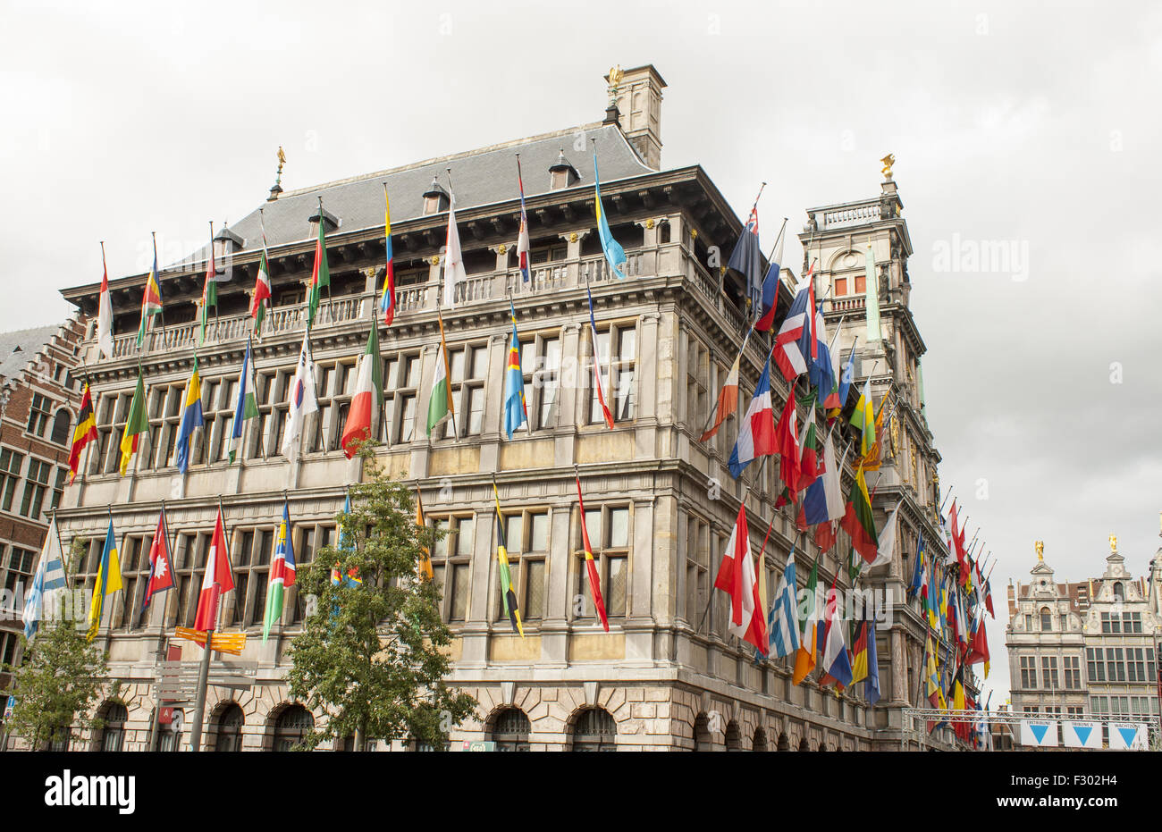 Town Hall in Antwerp with flags Stock Photo Alamy