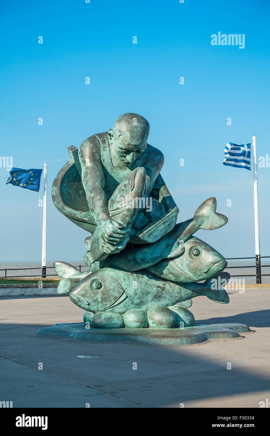 Fisherman Statue Sculpture. bronze statue, 'Embracing the Sea', by sculptor John Buck. Deal Pier Kent Stock Photo