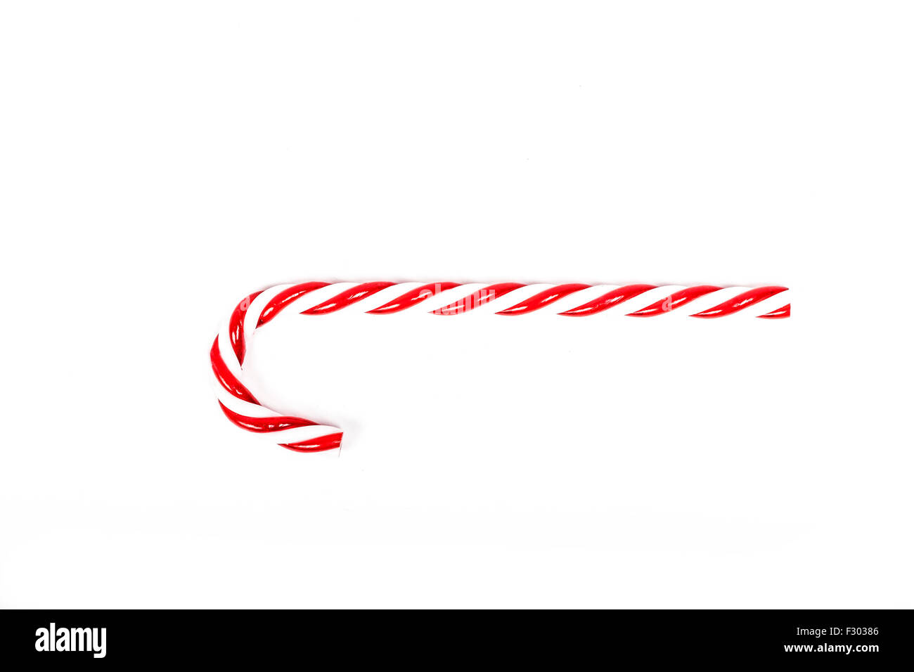 Christmas candy cane isolated Stock Photo Alamy