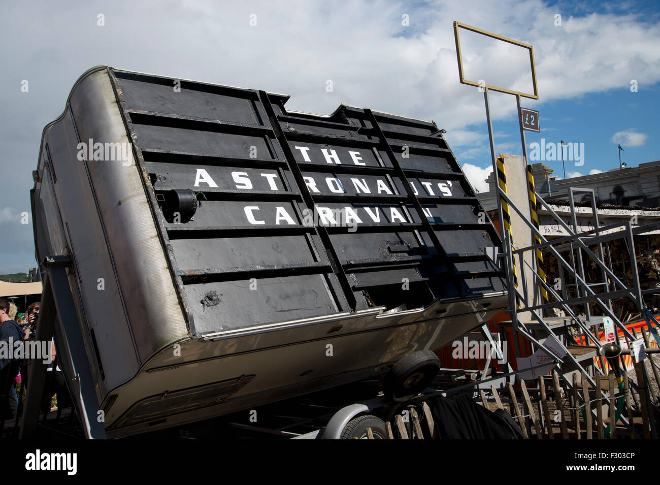 Dismaland, Bemusement Park, organised by Banksy .The Astronaut's caravan by Tim Hunkin and Andy Plant. Stock Photo