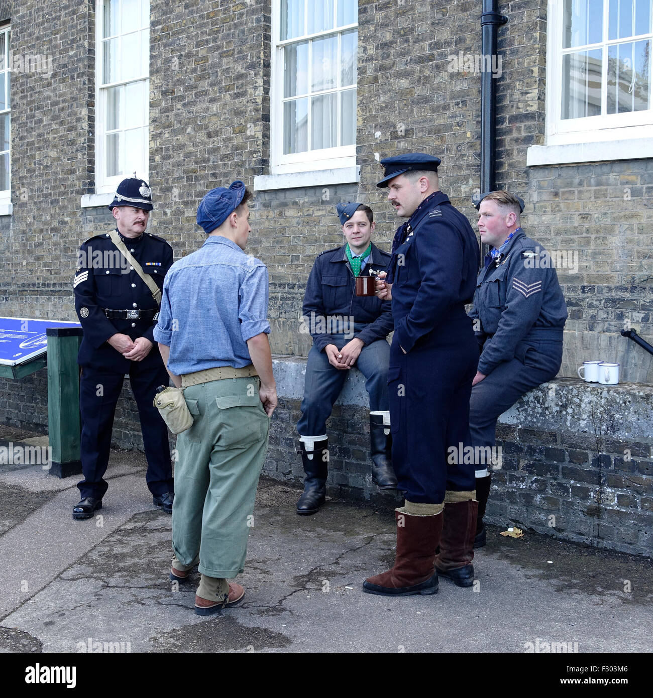 1940s WW2 Re-enactors Policeman and Military Personnel Stock Photo